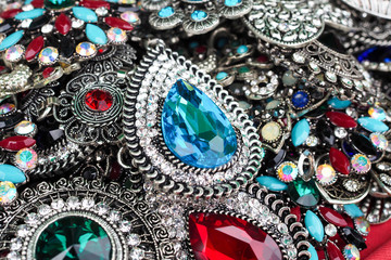 Brooches decorated with gemstones background