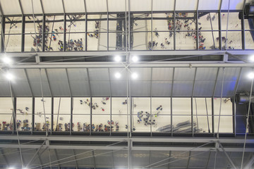 Background and texture of mirror ceiling in airport. Light bulb hanging on mirror ceiling.