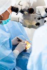 Eye surgery process, treatment of cataract and diopter correction. Surgical implementation of multifocal lens implants. Medical healthcare and technology theme.