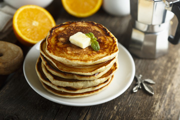 Homemade pancakes with honey and butter