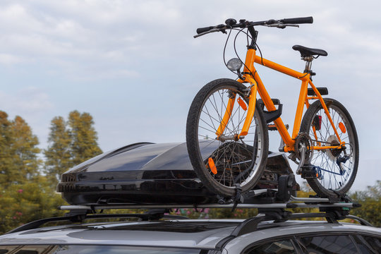 Transportation Of Bicycles On The Roof Of The Car. Concept: A Car Trip With A Bike