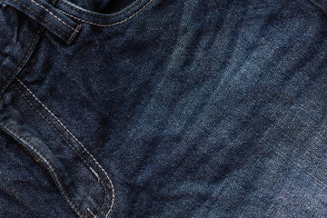 blue jeans texture wrinkles close up.