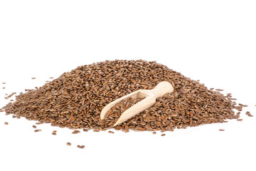 Fresh brown flaxseeds isolated on white