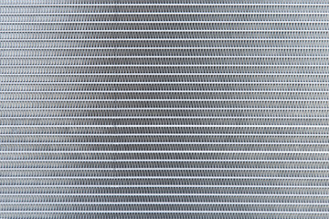 Industrial abstract steel background. The texture of the new aluminum car radiator
