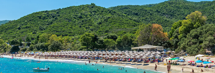 Fototapeta premium Olympiada, Greece - August 11, 2018: Proti Ammoudia beach, one of the most beautiful beaches in the Aegean Sea.