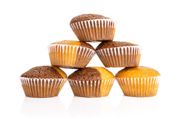 Set of six whole fresh baked marble muffin isolated on white background