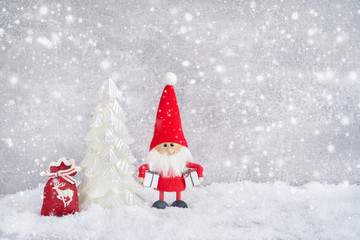 Christmas greeting card. Santa claus background with Christmas tree and snow. Copy space