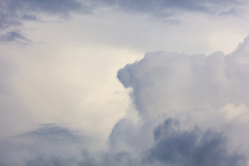 Fototapeta na wymiar White creamy clouds in the sky as a background
