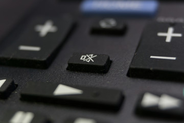 close up buttons of a remote control