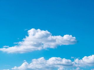 blue sky background with tiny clouds