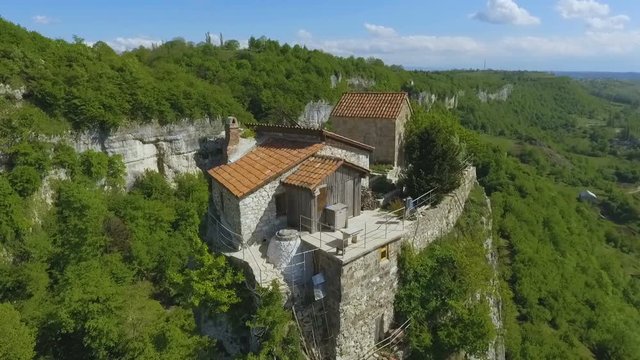 Tourist landmark Katskhi Pillar with ancient church on top in Chiatura, Georgia