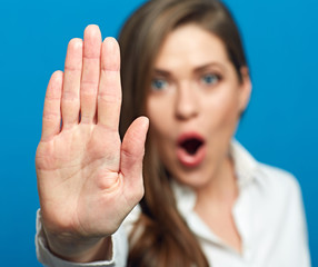 Screaming woman showing stop symbol.