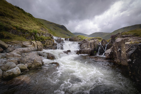 Serene and wild waterfall landscape Lake District England