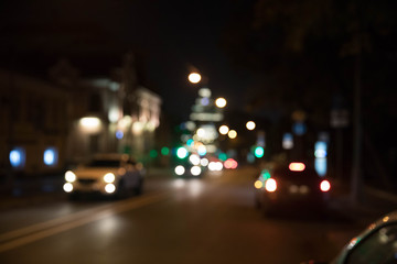 Texture from traffic of light fires of the night city against a dark background. Motion blur