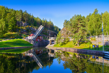 View of the Telemark Canal with old locks - tourist attraction in Skien, Norway - obrazy, fototapety, plakaty