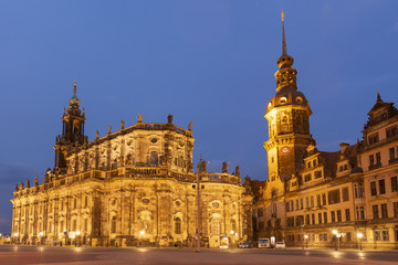 Fototapeta na wymiar Cathedral of the Holy Trinity (Katholische Hofkirche) and Dresden castle, Germany.