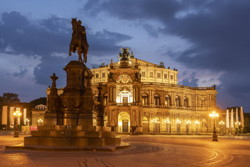 Fototapeta na wymiar King John Memorial, in front of the Semperoper Opera House at night, Dresden, Saxony, Germany.