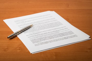 Pen on top of a contract