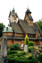 Fototapeta na wymiar Vang stave church, medieval norwegian wooden church transferred in 19th century from Vang in the Valdres region of Norway to Karpacz in Poland. 