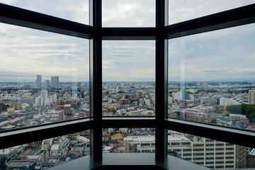 Fototapeta na wymiar スターウォーズの宇宙船のような窓からの東京