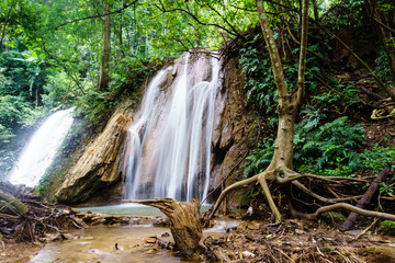 Beautiful and inaccessible mountain waterfall "Tad Ka". Laos.