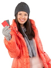 Young beautiful woman in red winter jacket holding cards