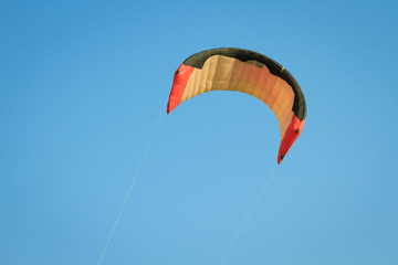 kite wing over blue sky