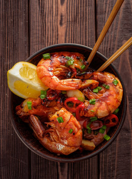 Fried Prawns with pepper, garlic and lemon. Mediterranean cuisine. Asian cuisine. Top view
