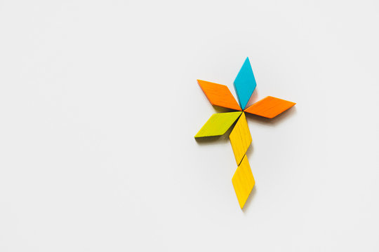 Tangram puzzle flower shape use for education and creative concept