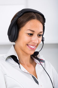 woman with headset in call center