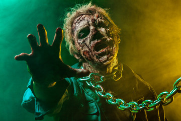Close-up portrait of a horrible scary zombie man. Horror. Halloween 2018