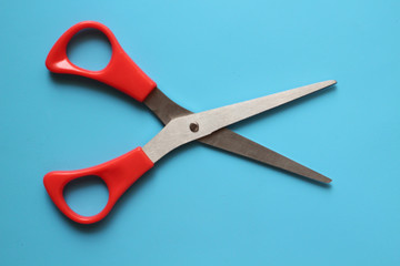 variations of layouts of stationery items, scissors on a colored background