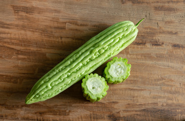  Fresh bitter gourd or bitter melon on wood background