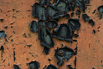 Pealed off paint revealing a rusty texture underneath