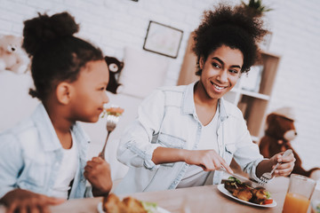 Beautiful Mother and Daughter Test Food Together.