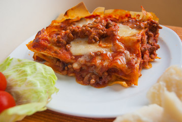 Lasagne with layers of minced meat and Parmesan cheese
