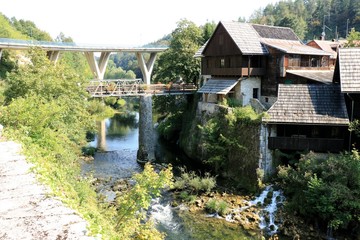 Fototapeta na wymiar bridge and waterfall in Rastoke, Croatia
