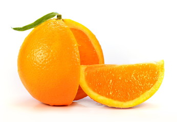 Juicy orange with cut slice isolated on white background