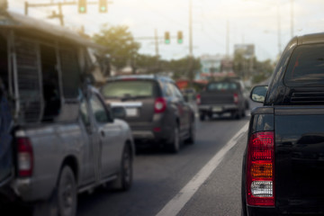 Transportation of pick up car stop on the road in traffic junction at day.