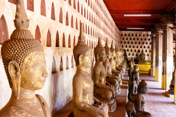 Fototapeta premium Buddha statues at Pha that Luang. Laos. Vientiane.
