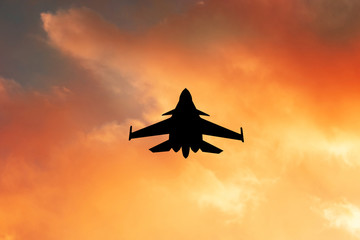 warplane at sunset
