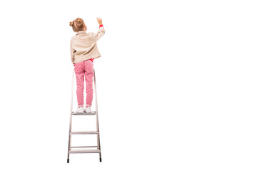 rear view of schoolchild standing on ladder and writing isolated on white © LIGHTFIELD STUDIOS
