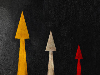 Triple arrow on dark road background with copy space, business concept