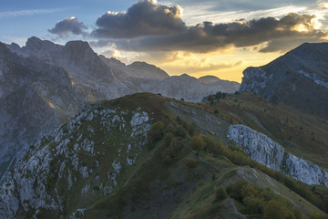 Stunning sunset at Prokletije mountain, Montenegro. View from Volusnica peak. Landscape, travel...