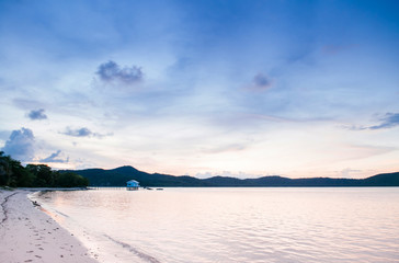 Peaceful white sand beach sunset sky of Koh Mud Sum island near Samui isalnd, Thailand