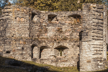 Stone wall of an ancient monastery destroyed during the Livonian War in the Middle Ages