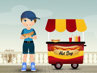 child eats the hot odg