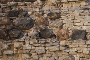 Stone wall of an ancient monastery destroyed during the Livonian War in the Middle Ages
