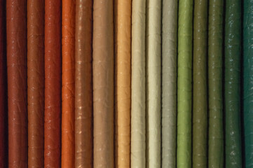 Catalog of multicolored imitation leather from matting fabric texture background, leatherette fabric texture, industry background