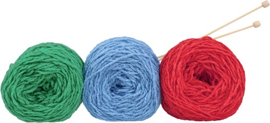 Balls of yarn with knitting needles